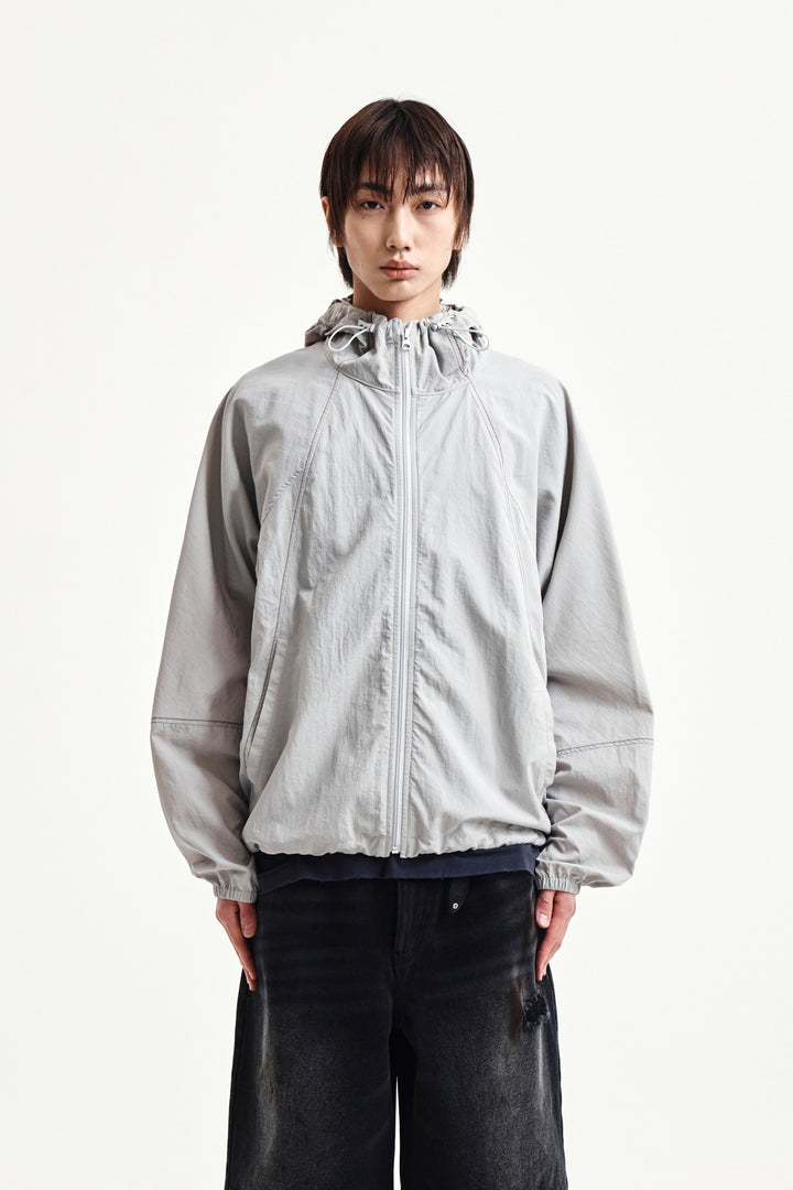Matin Kim Back Logo Windbreaker — Light — Beige