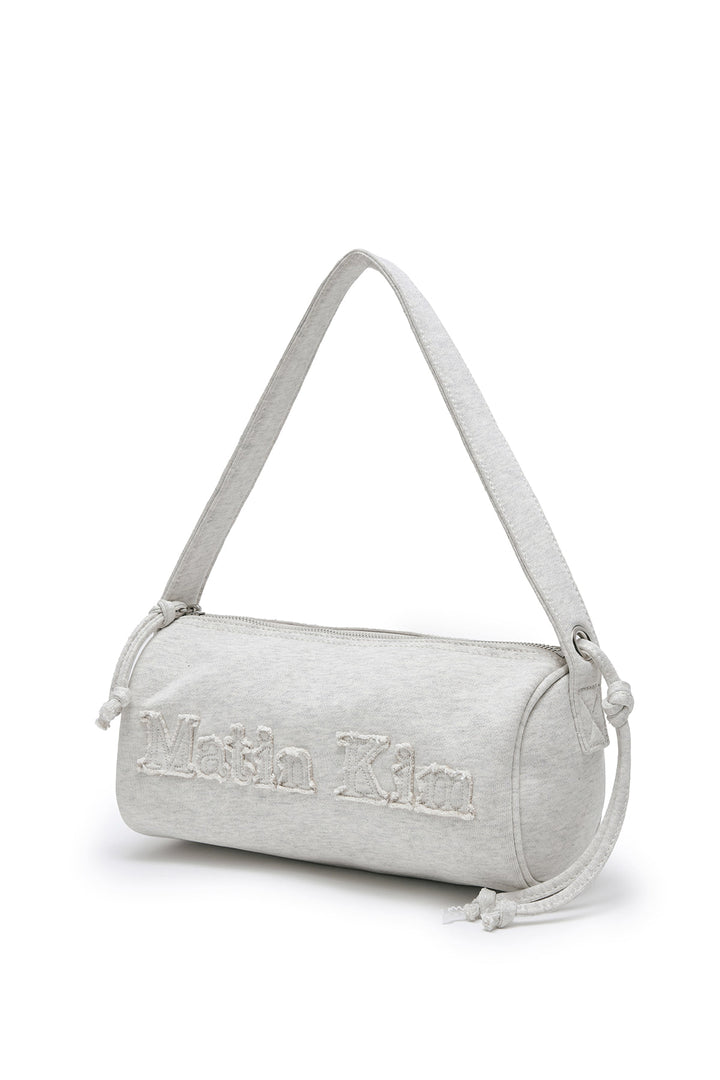 Matin Kim Appliqué Logo Jersey Duffle Bag — Beige
