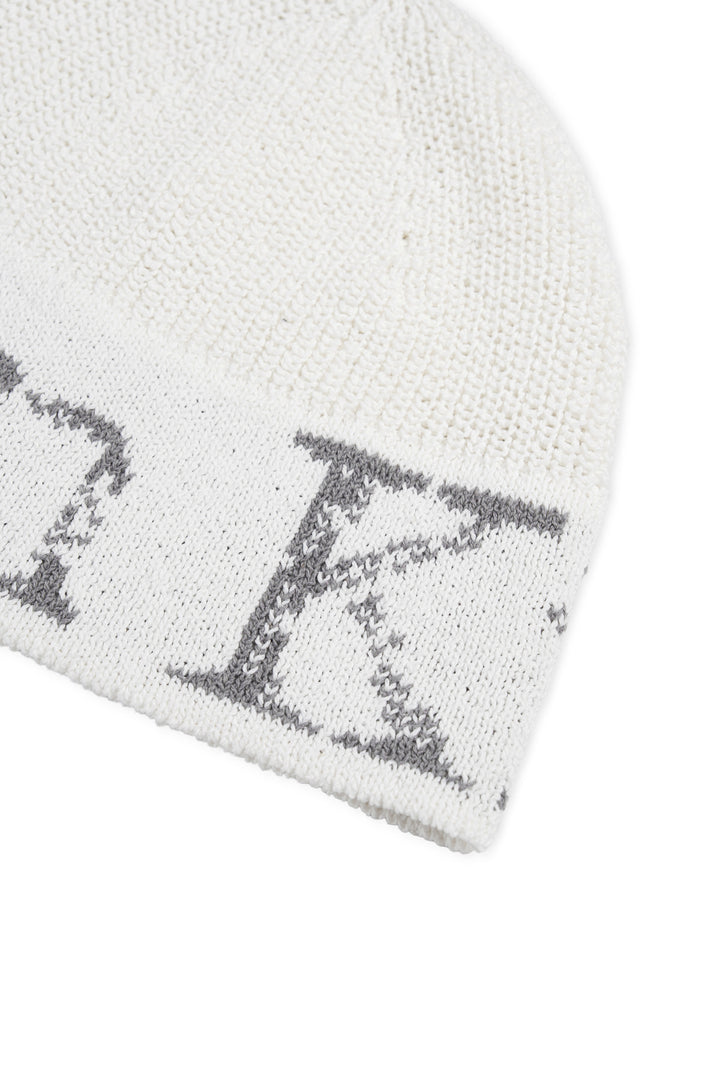 Matin Kim Cracked Logo Light Bucket Beanie — Ivory