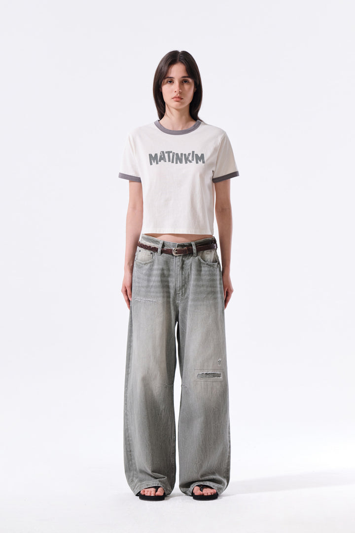 Matin Kim Back Logo Washed Denim Pants — Khaki