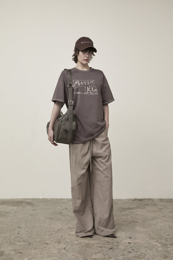 Matin Kim Side Logo Wide Track Pants — Khaki