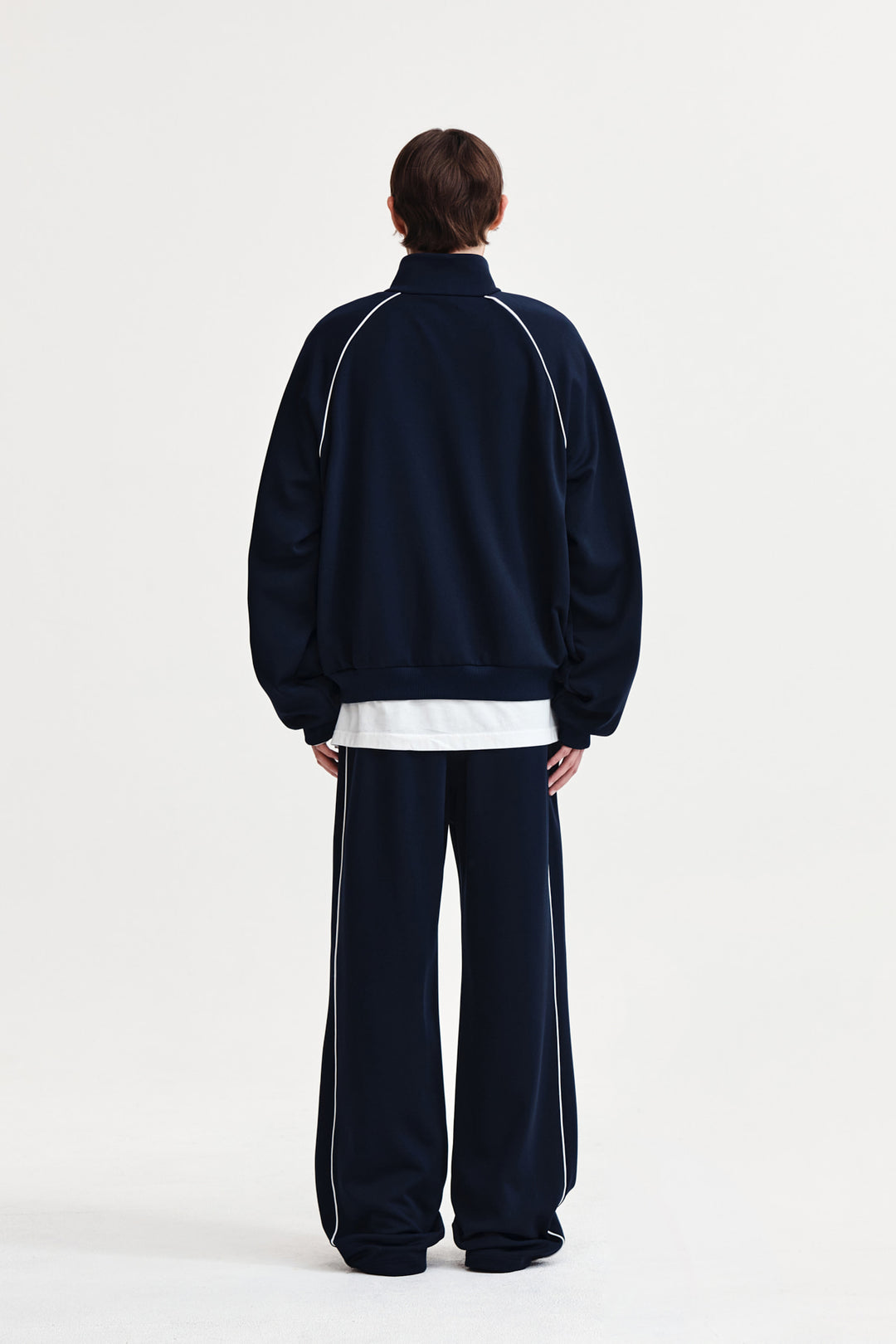 Matin Kim Heart Logo Track Pants — Navy blue