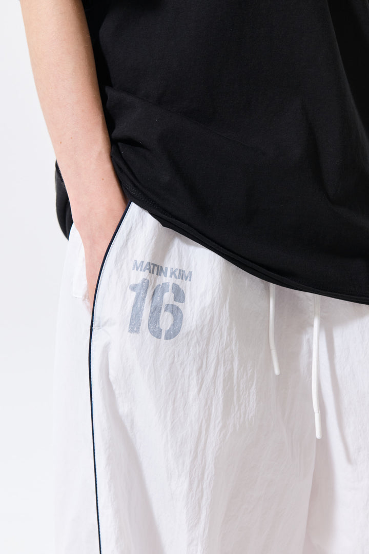 Matin Kim 16 Logo Track Pants — White