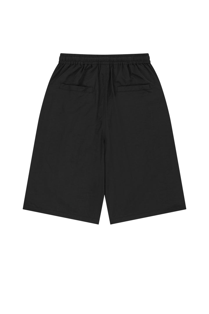 Matin Kim Side Logo Bermuda Track Pants — Black