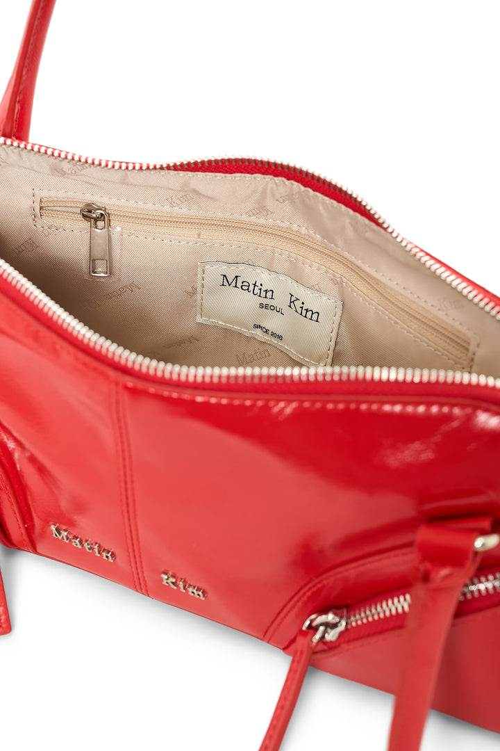 Matin Kim Curve Zip Baguette Bag — Red