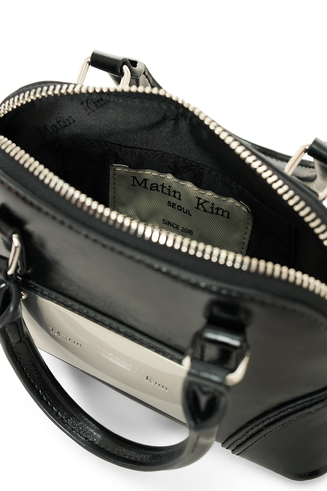 Matin Kim Curve Zip Mini Bag — Black