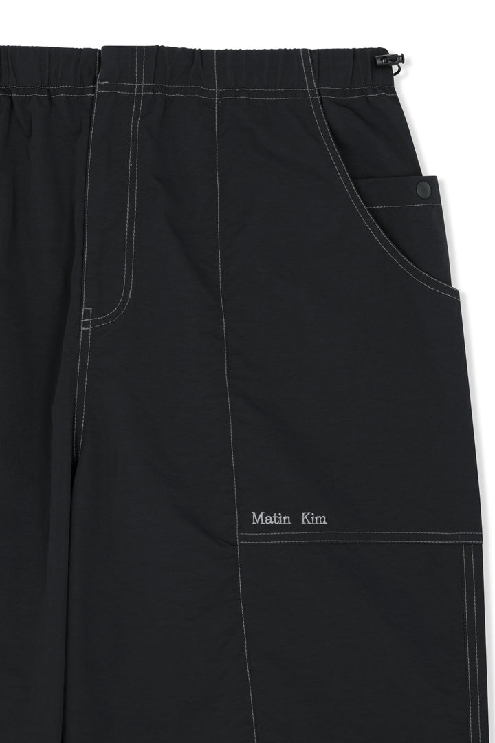 Matin Kim Multi Panel Parachute Pants — Black