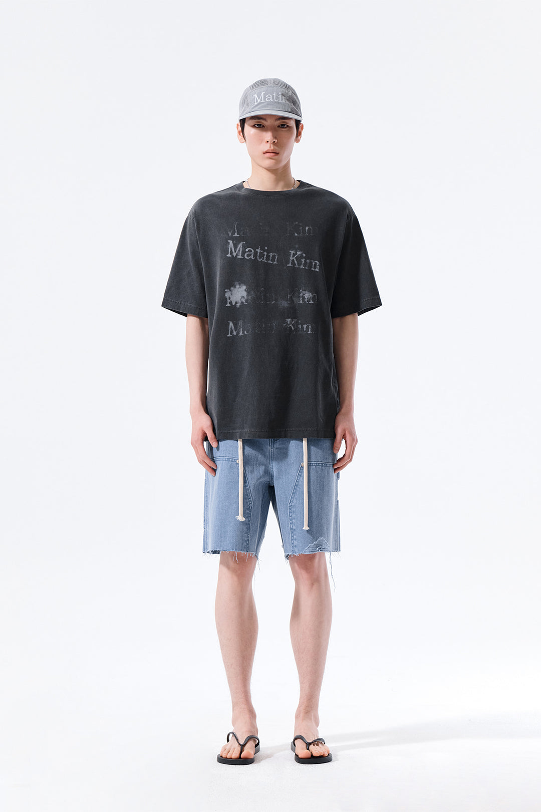 Matin Kim Herringbone Raw Cut Denim Shorts — Light Blue