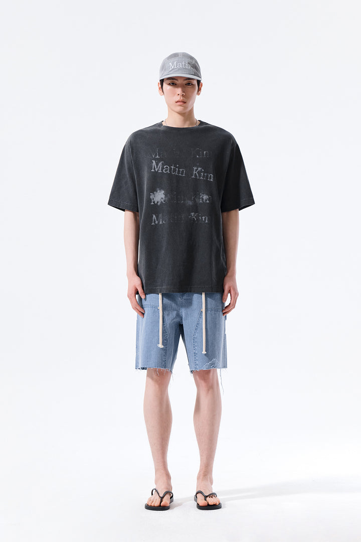 Matin Kim Herringbone Raw Cut Denim Shorts — Light Blue