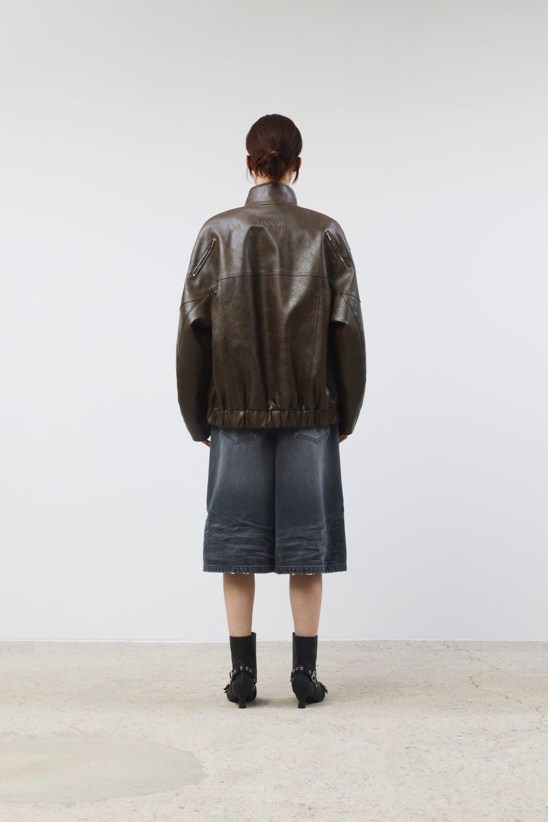 KIMMATIN Oversize Leather Biker Jumper — Brown