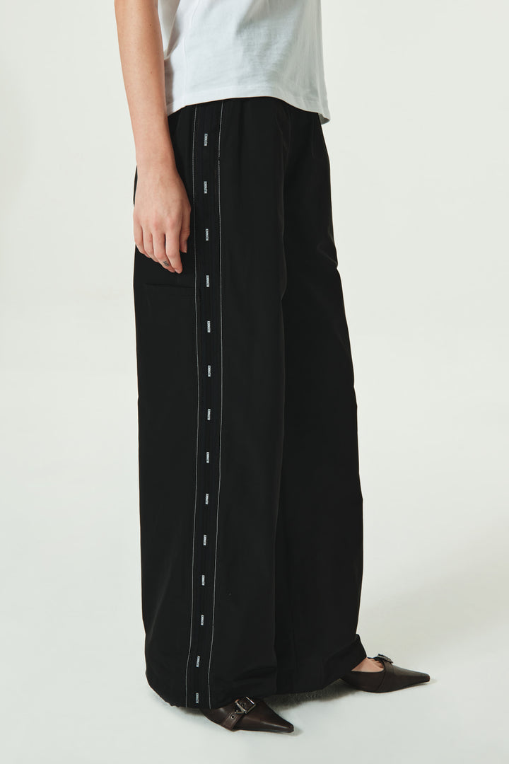 KIMMATIN Side Logo Point Track Pants — Black