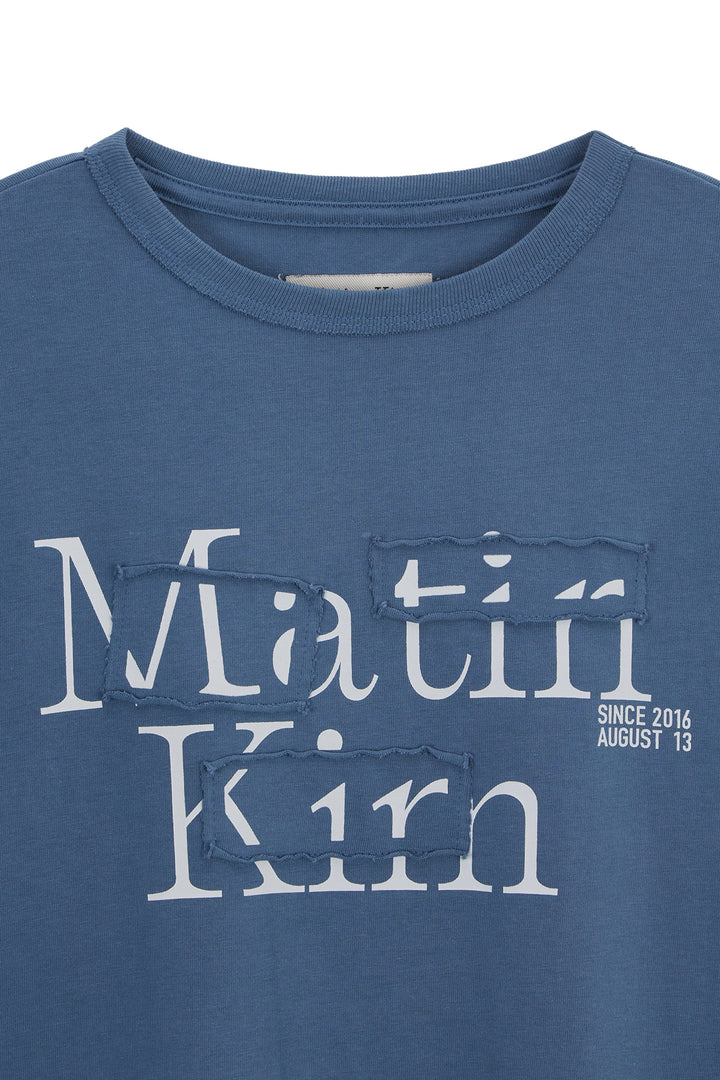 Matin Kim Patch Graphic Long Sleeve Top — Blue