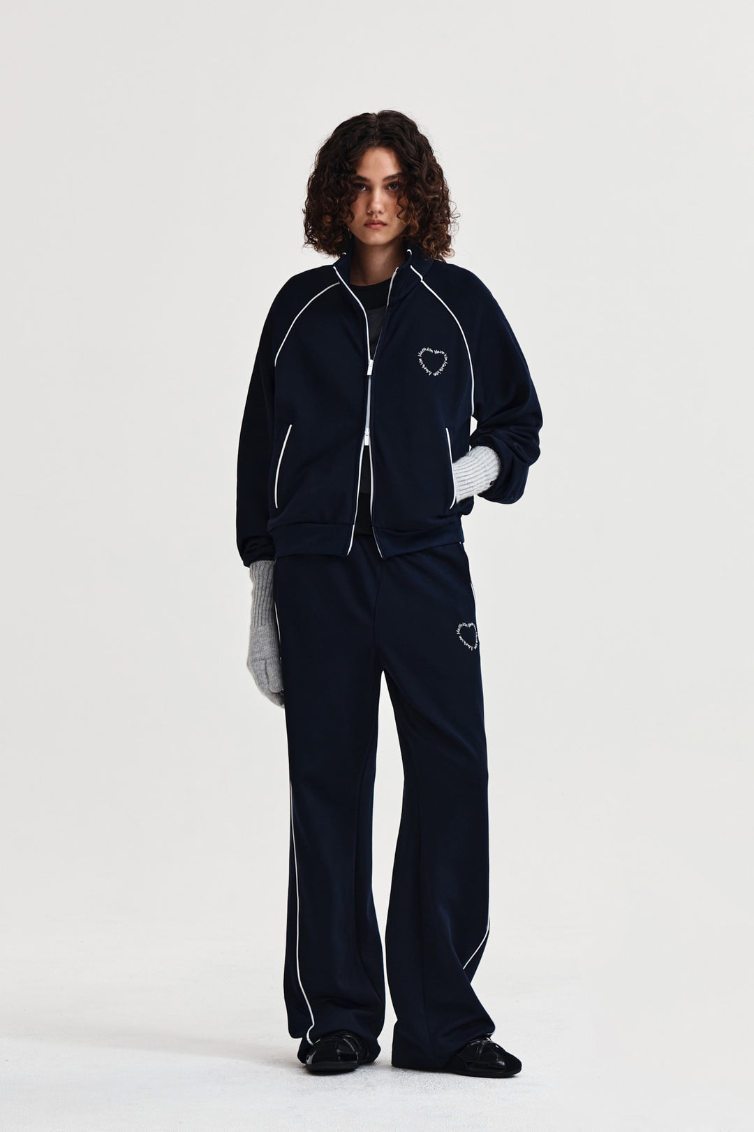Matin Kim Heart Logo Track Pants — Navy blue