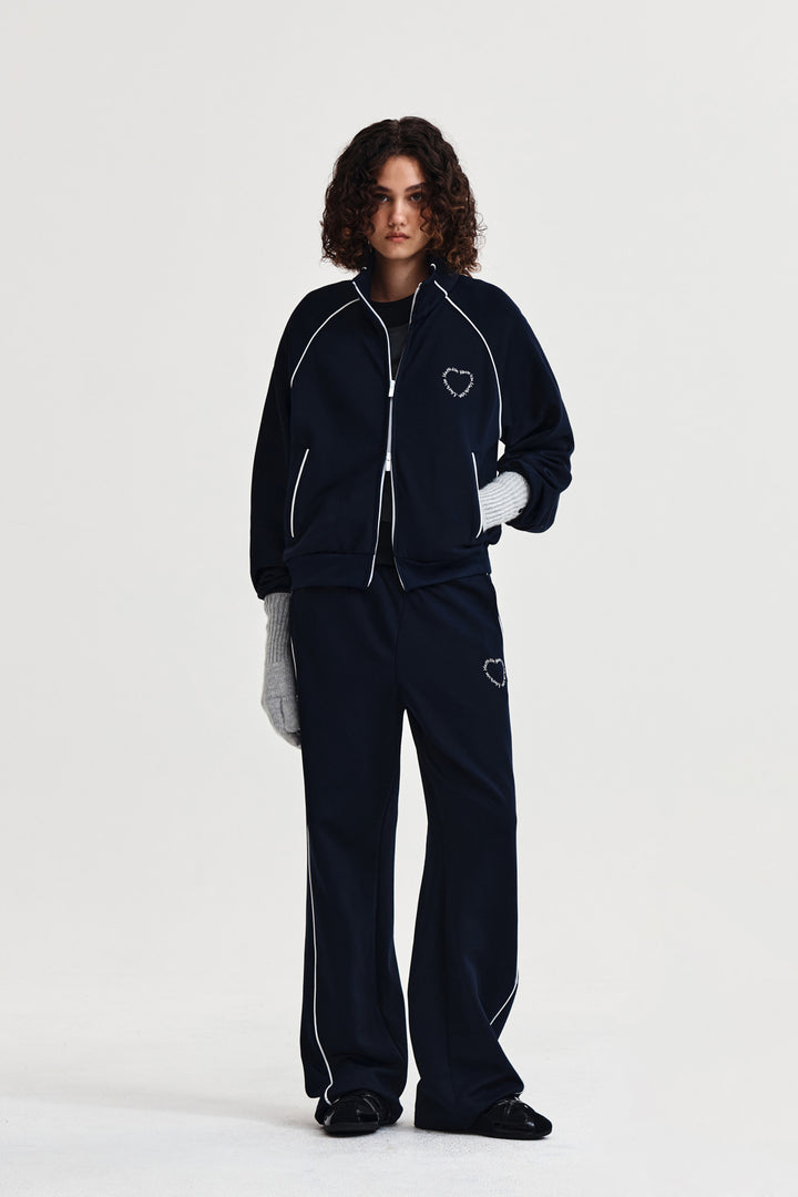 Matin Kim Heart Logo Track Pants — Navy blue