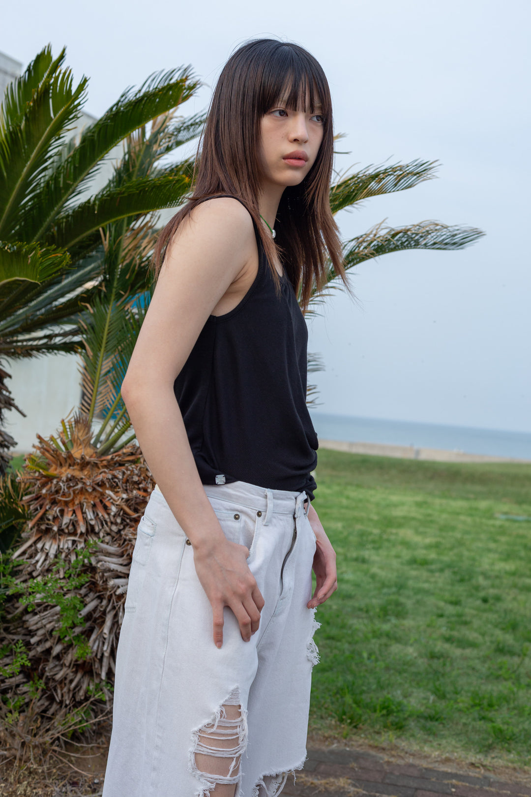 Matin Kim Unbalance Tuck Sleeveless Top — Black