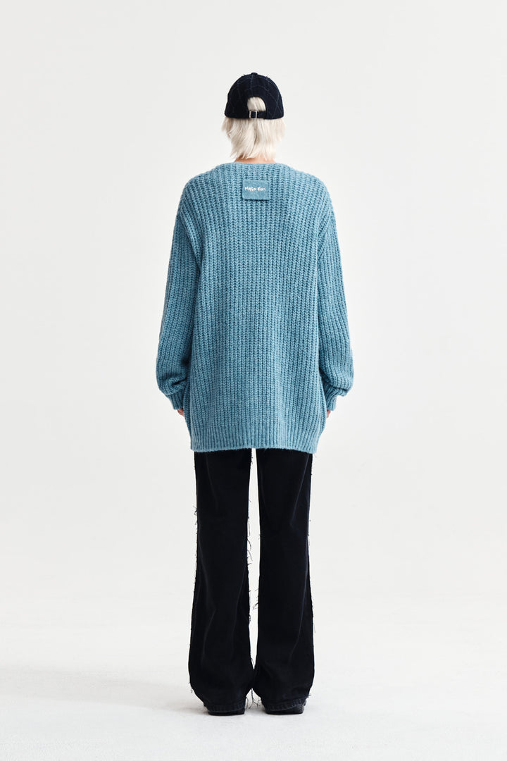 Matin Kim Side Button Point Overfit Cardigan — Light Blue