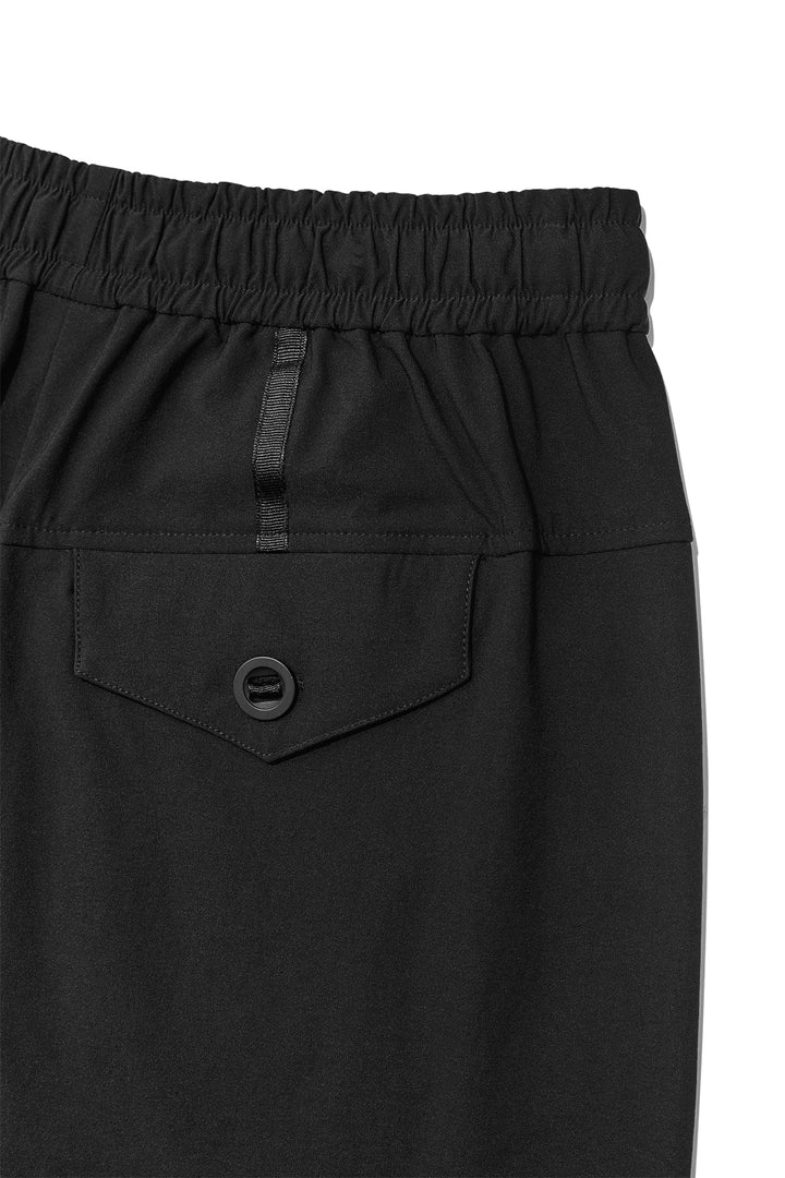 Matin Kim Side Taping Bermuda Shorts — Black