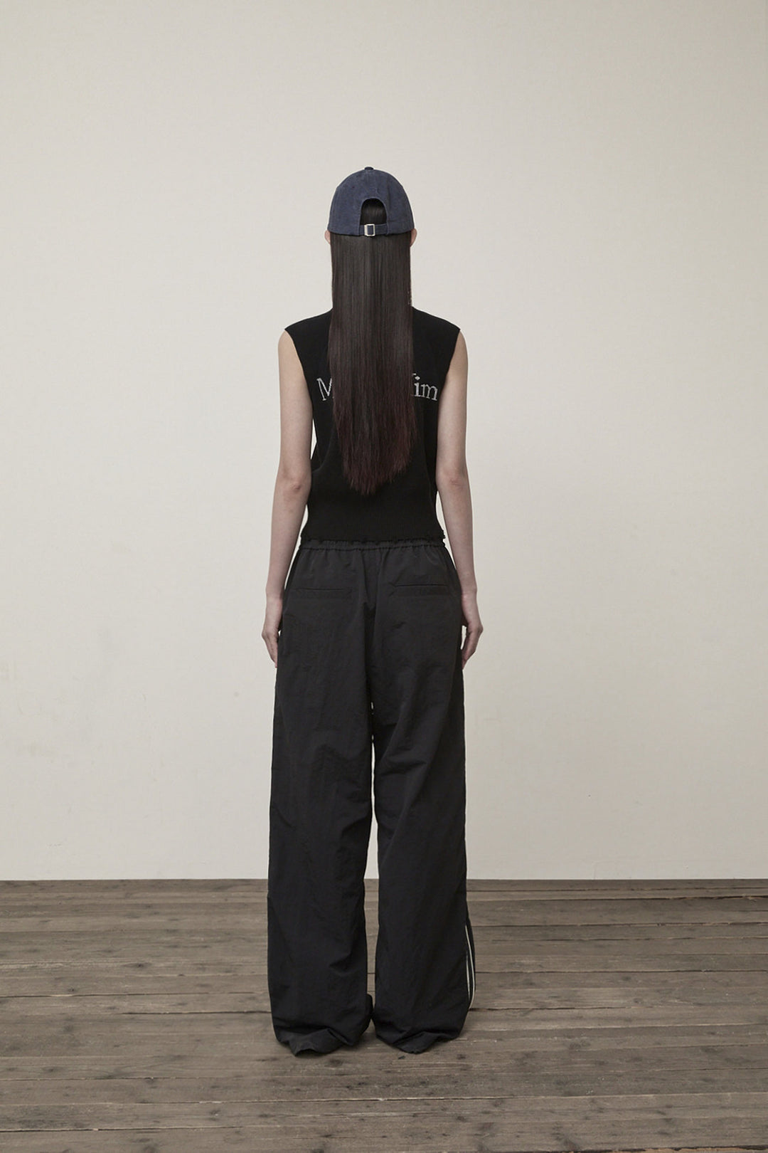 Matin Kim High Neck Logo Knit Zip Vest — Black
