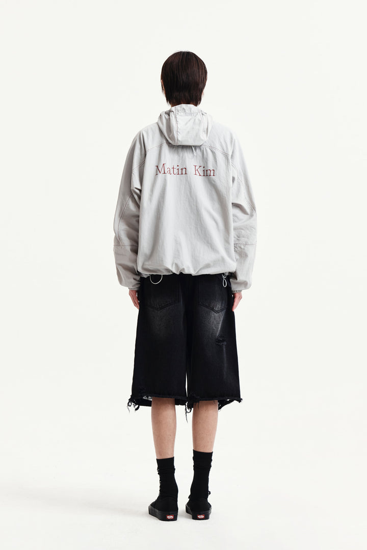 Matin Kim Back Logo Windbreaker — Light — Beige