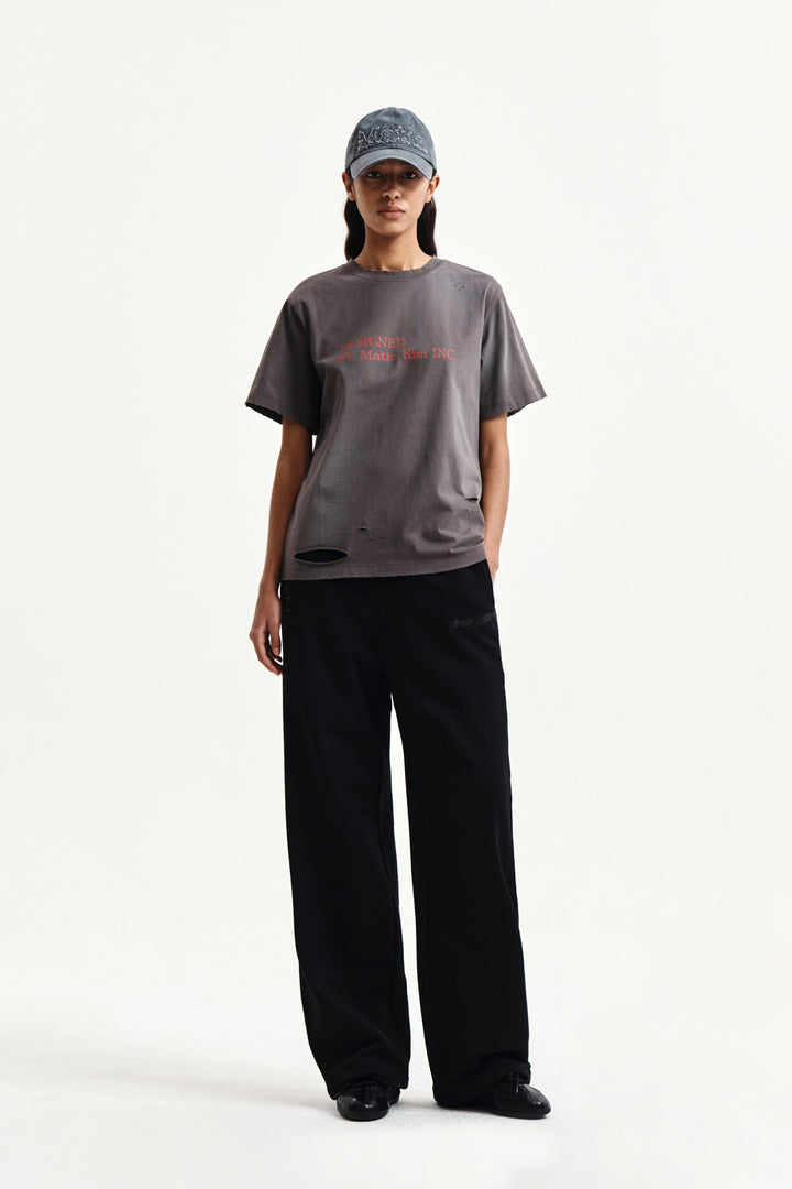 Matin Kim Spray Washed Lettering Damaged Top — Charcoal