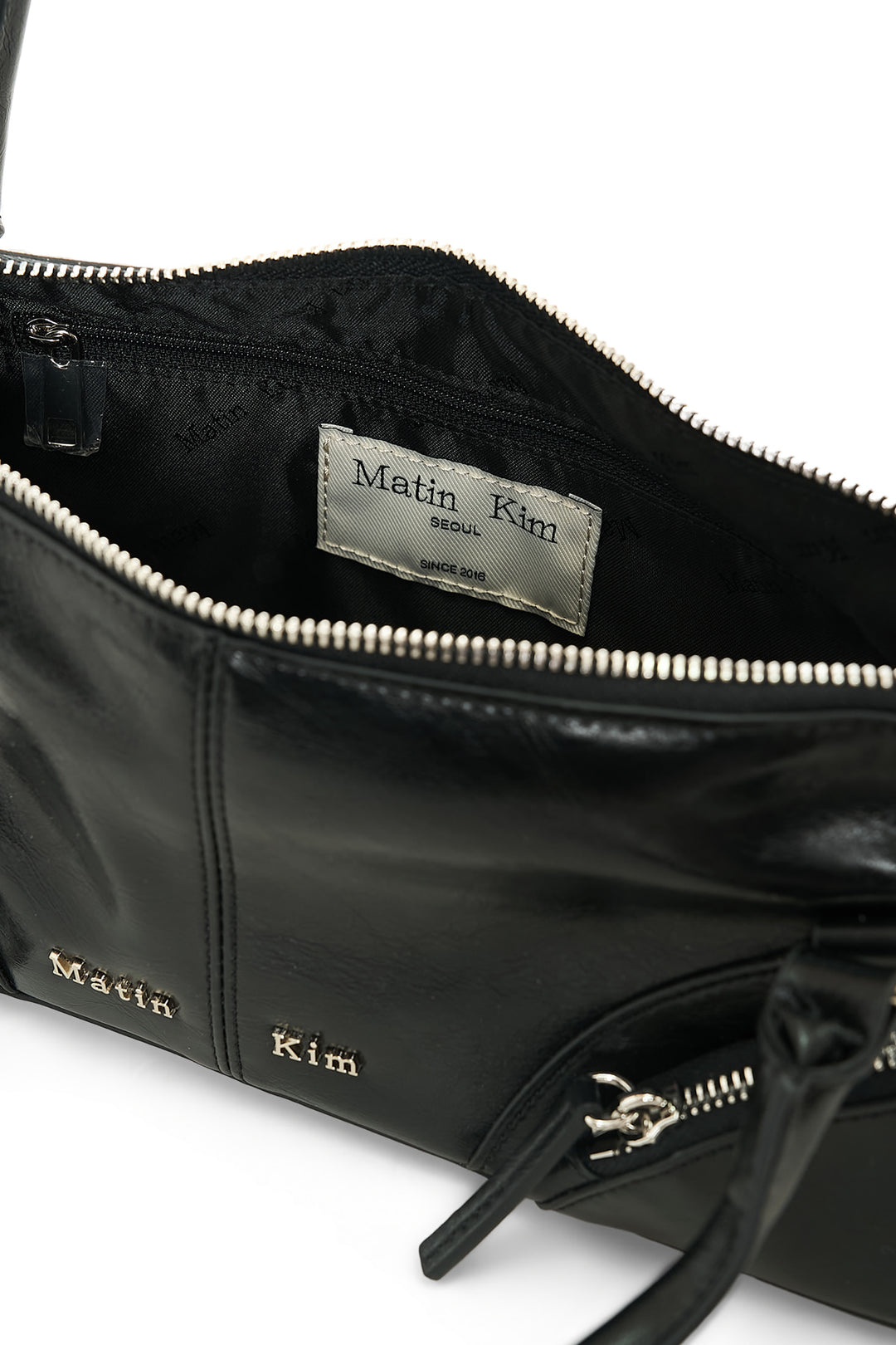 Matin Kim Curve Zip Baguette Bag — Black