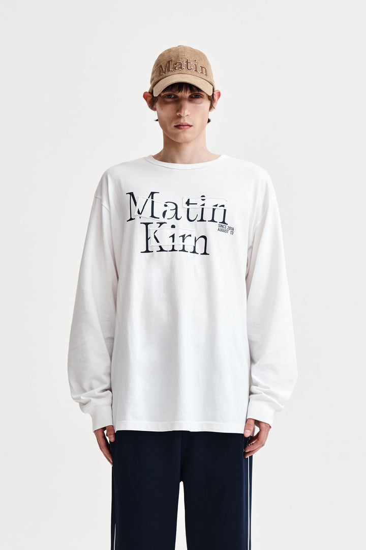 Matin Kim Patch Graphic Long Sleeve Top — White
