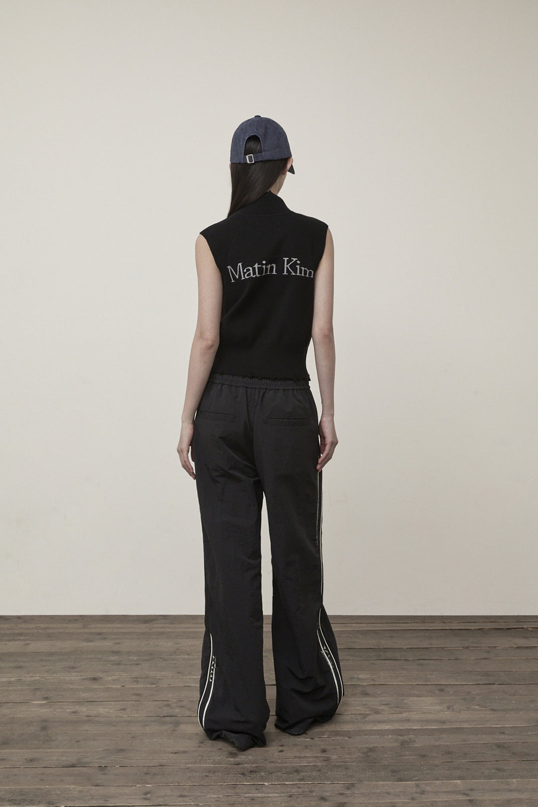 Matin Kim High Neck Logo Knit Zip Vest — Black