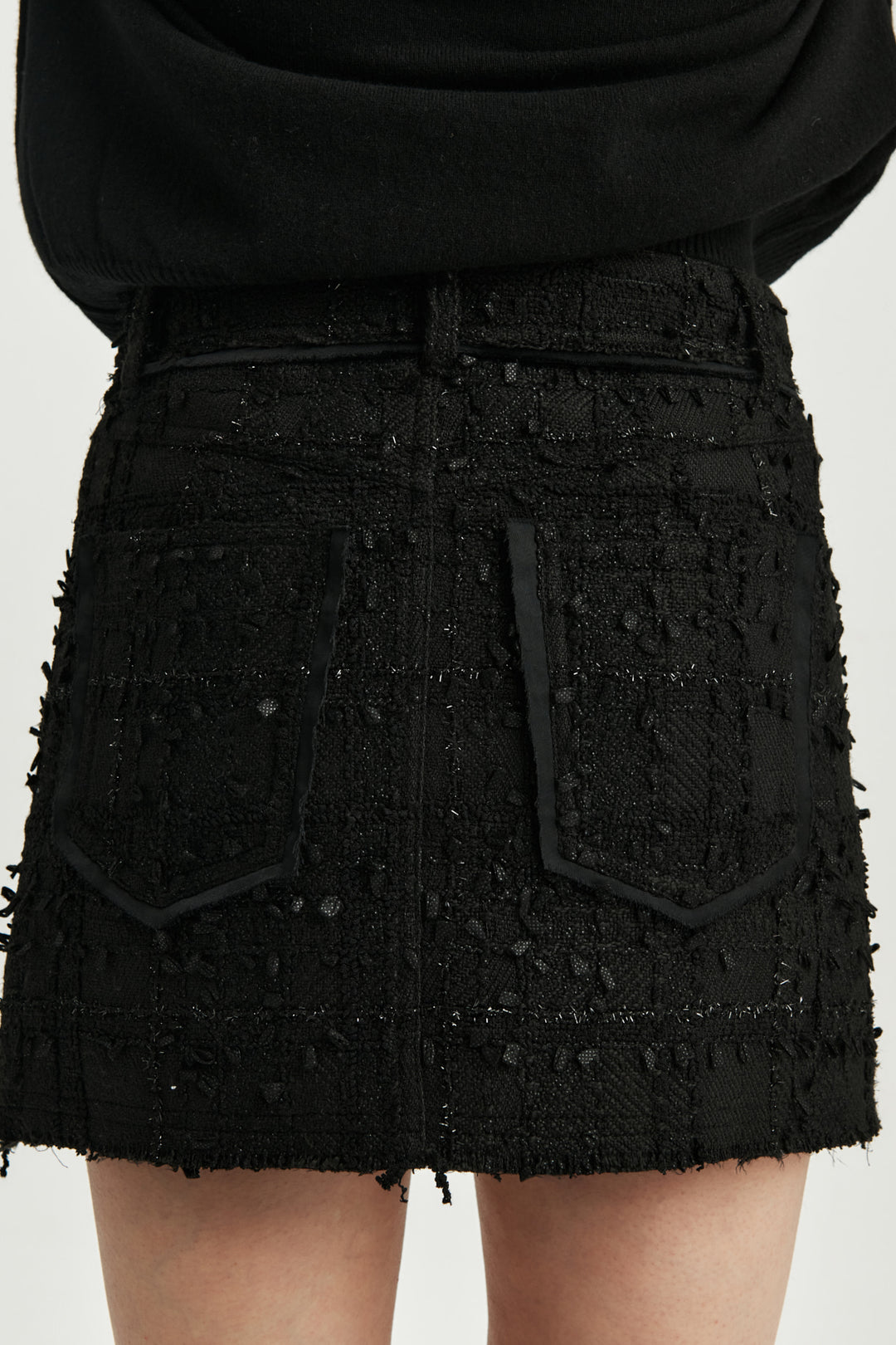 KIMMATIN Cut Point Tweed Mini Skirt — Black