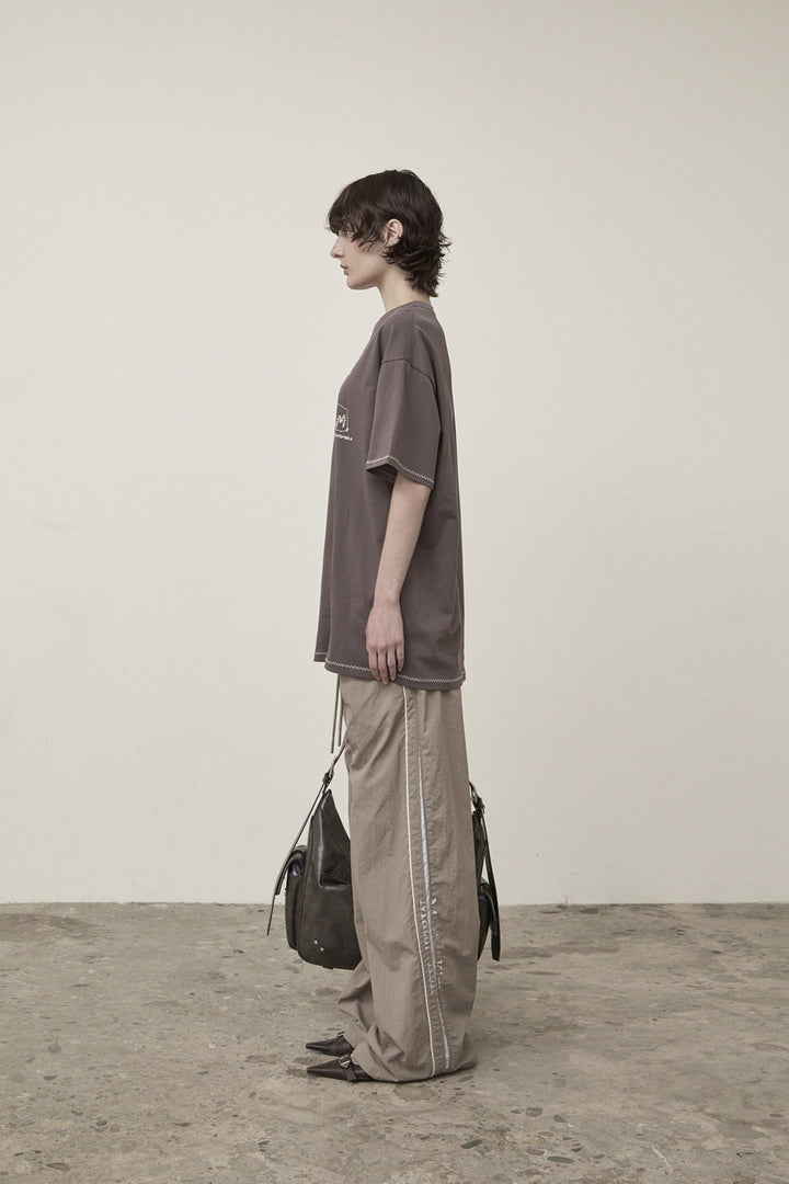 Matin Kim Side Logo Wide Track Pants — Khaki