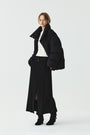 KIMMATIN Slit Point H Line Long Skirt — Black