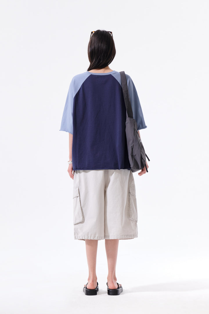 Matin Kim Raw Edge Raglan Top — Navy blue