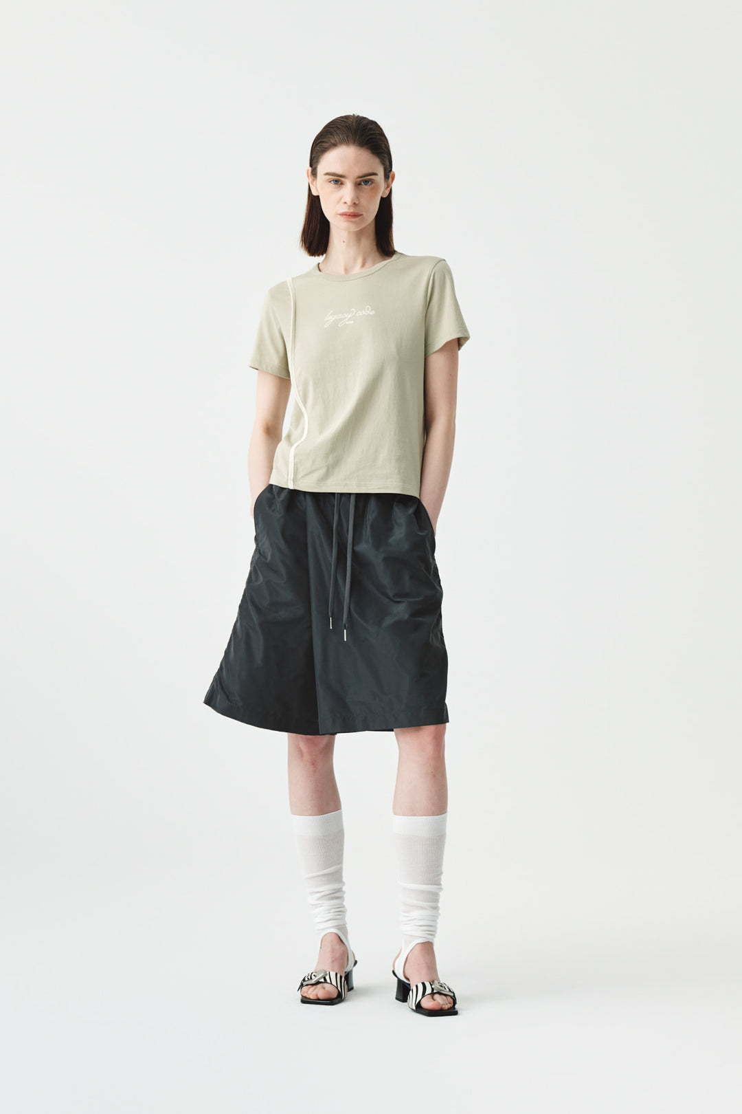KIMMATIN Back Slit Slim Top in Light — Khaki