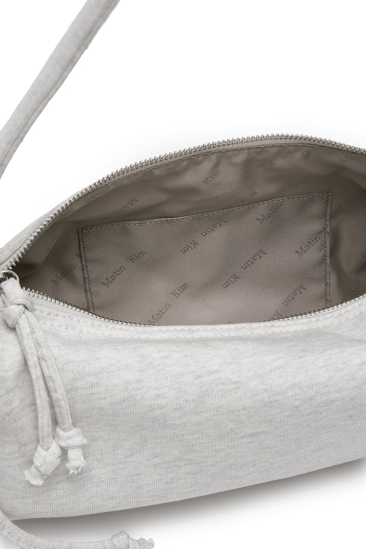 Matin Kim Appliqué Logo Jersey Duffle Bag — Beige