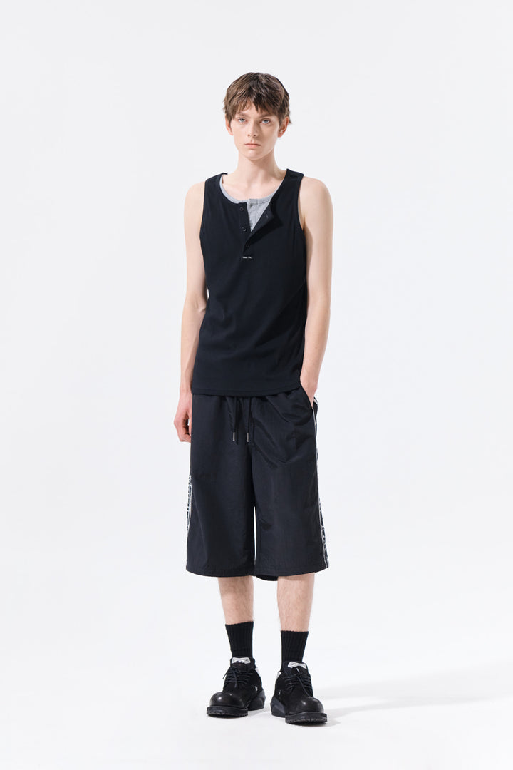 Matin Kim Side Logo Bermuda Track Pants — Black