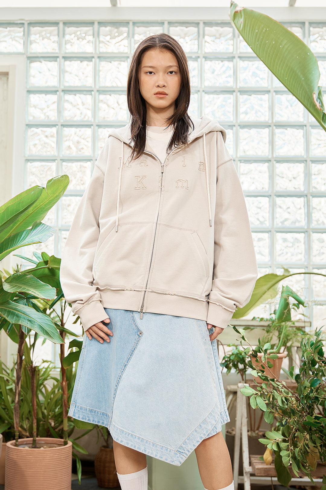 Matin Kim Appliqué Cutout Logo Zip Hoodie — Beige