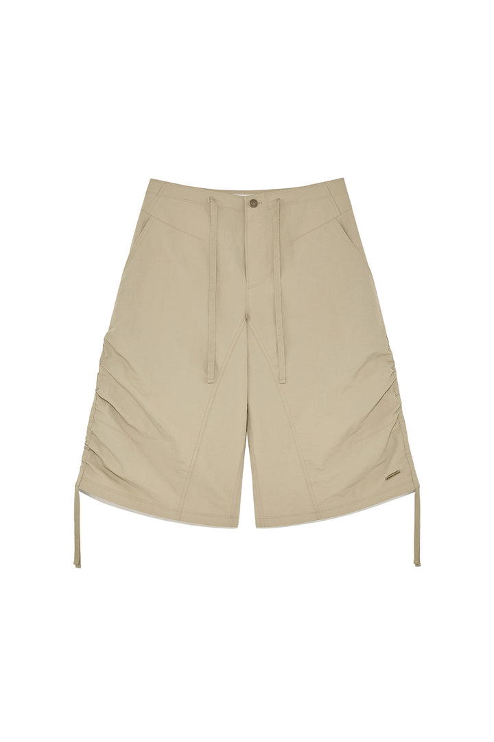 Matin Kim Nylon String Half Pants — Beige