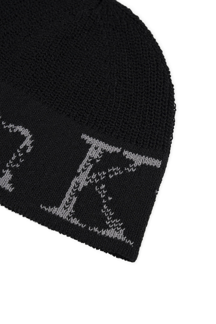 Matin Kim Cracked Logo Light Bucket Beanie — Black