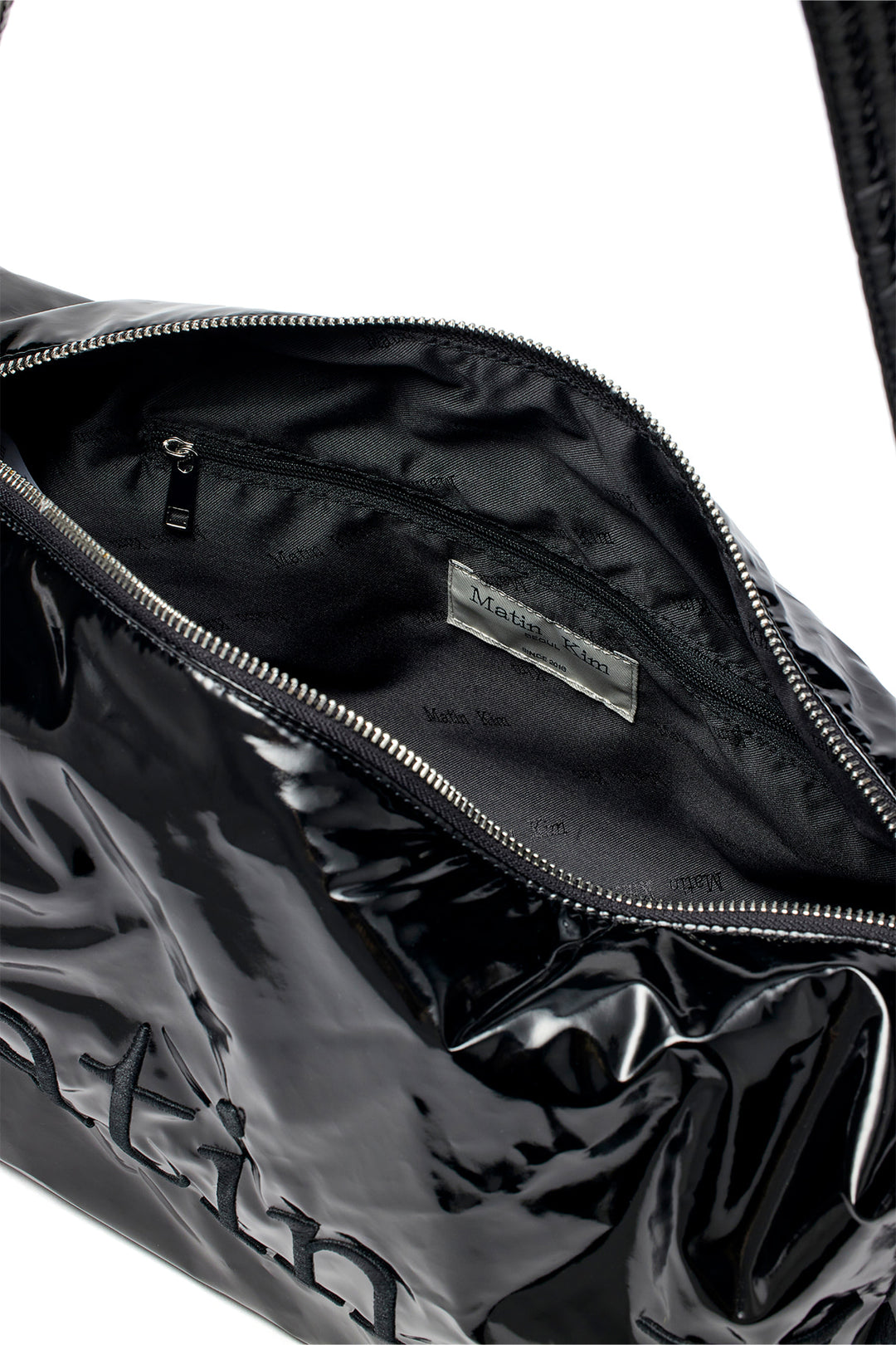 Matin Kim Glossy Logo Stitch Cross Bag — Black