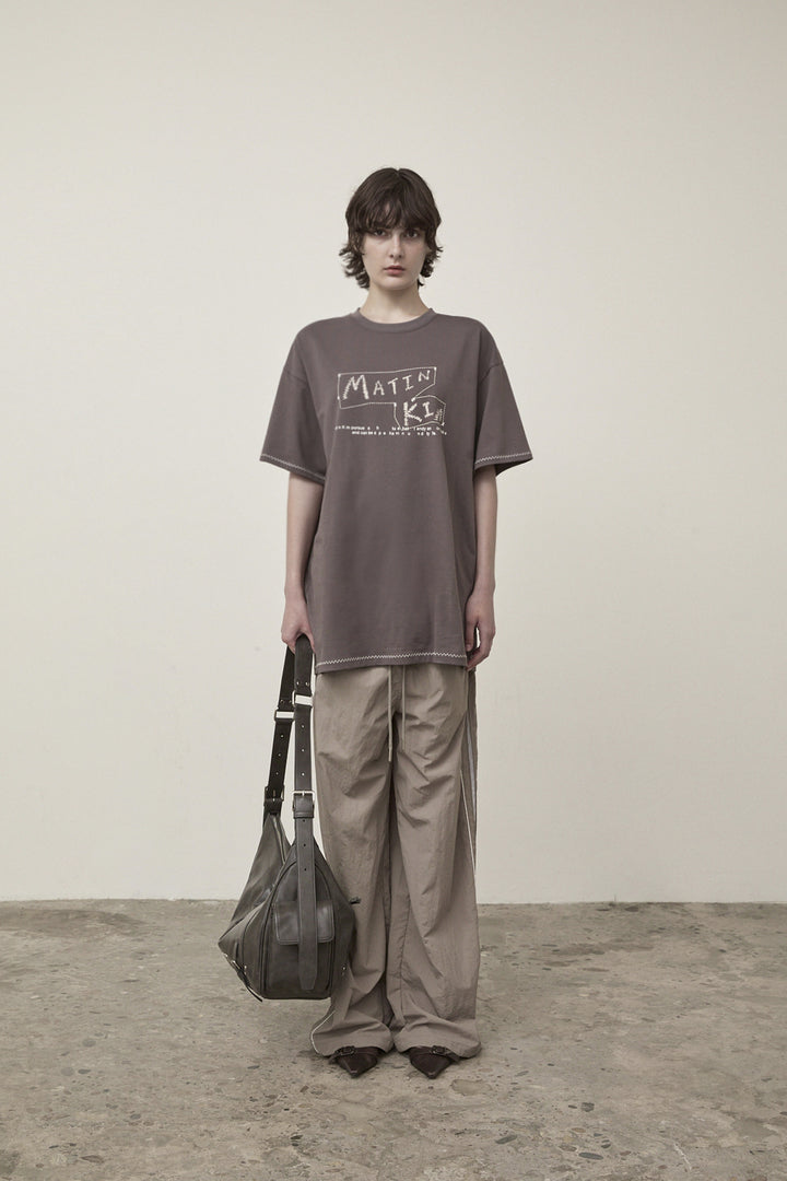 Matin Kim Side Logo Wide Track Pants — Khaki