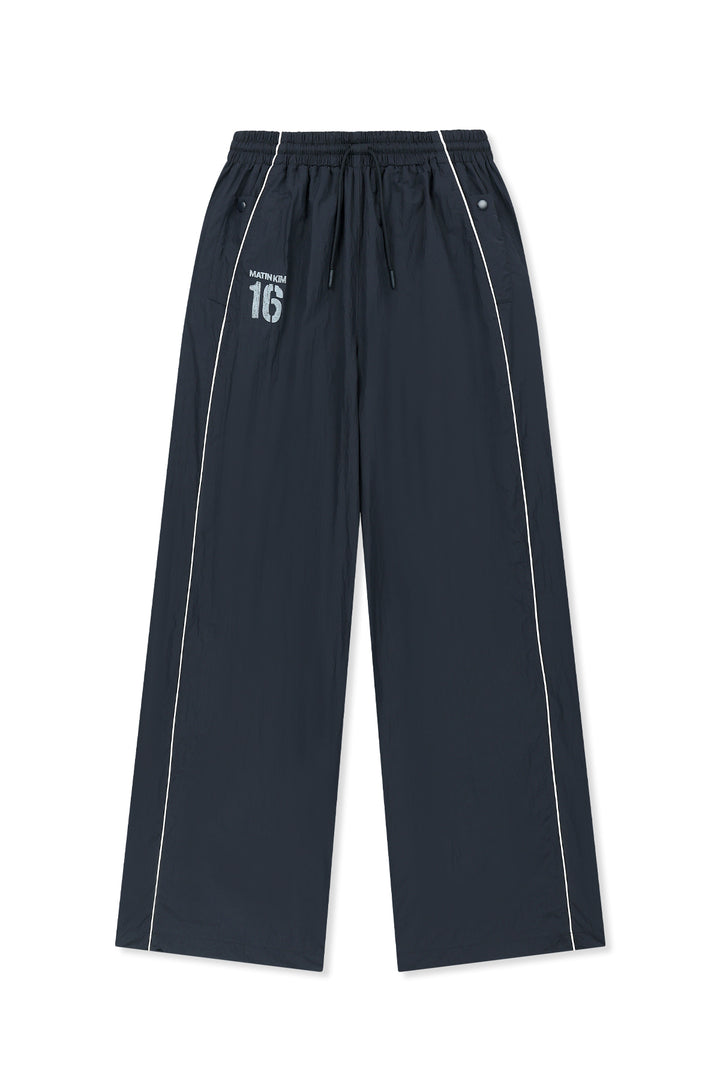 Matin Kim 16 Logo Track Pants — Navy blue