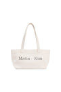 Matin Kim Logo Canvas Wide Shoulder Bag — Ivory