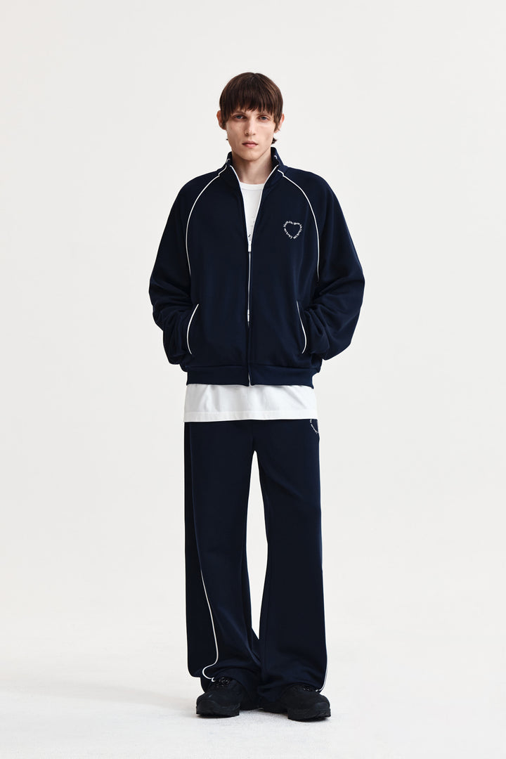 Matin Kim Heart Logo Track Pants — Navy blue
