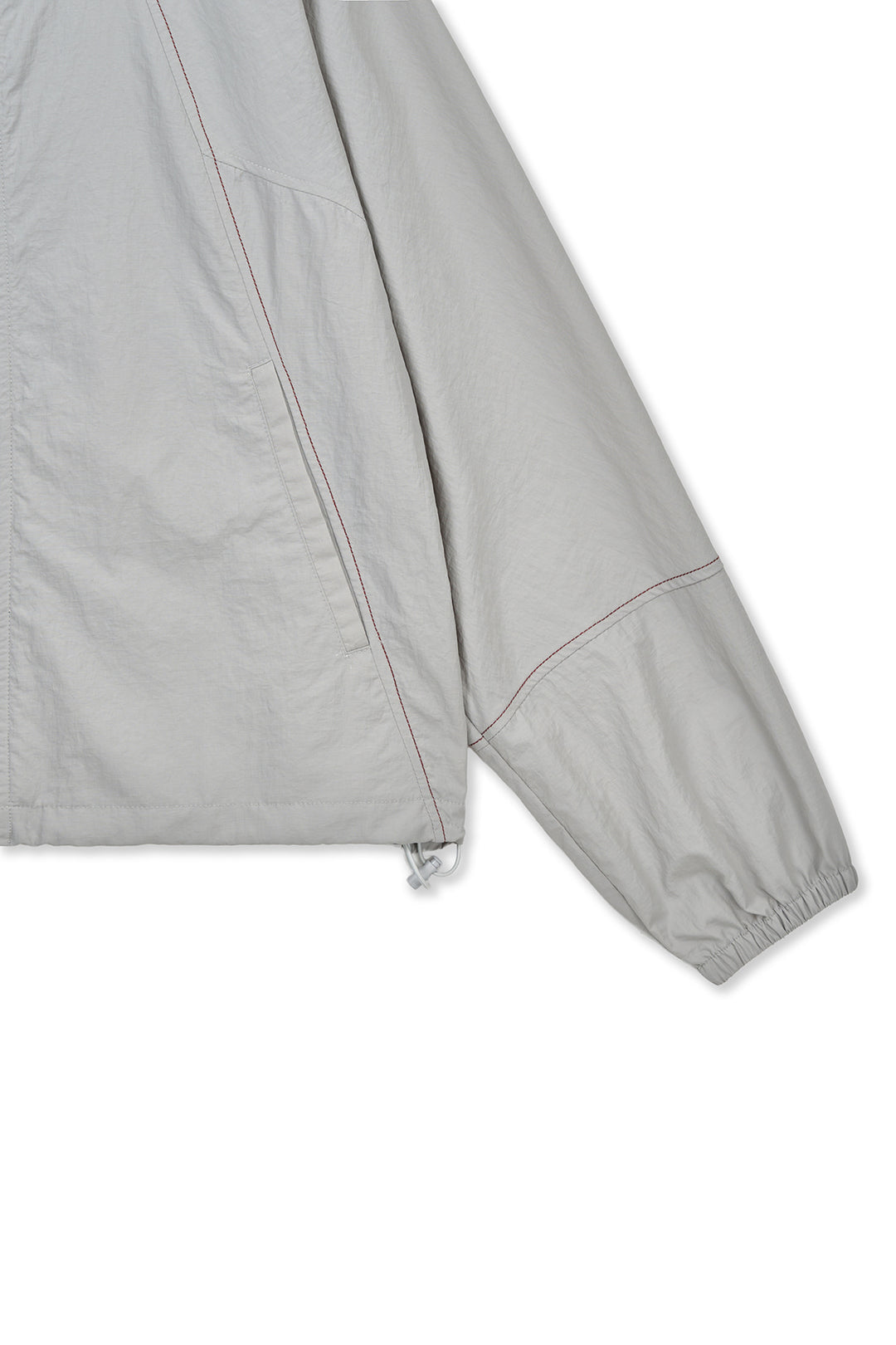 Matin Kim Cropped Back Logo Windbreaker — Beige