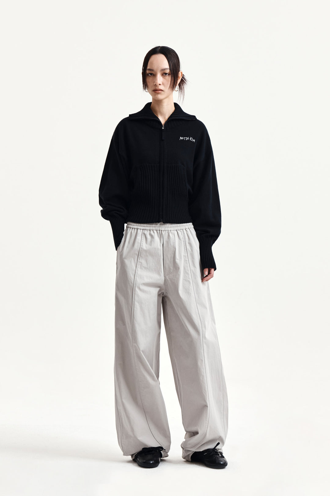 Matin Kim High Neck Embroidered Logo Zip Up — Black