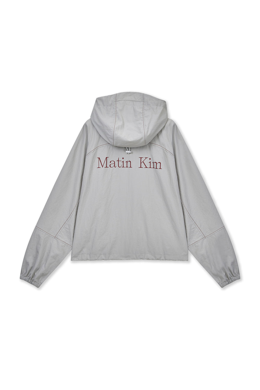 Matin Kim Cropped Back Logo Windbreaker — Beige