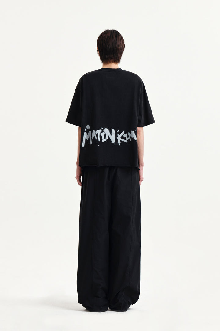 Matin Kim Raw Cut Graffiti Logo Top — Black
