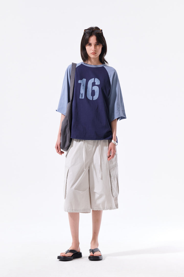 Matin Kim Raw Edge Raglan Top — Navy blue