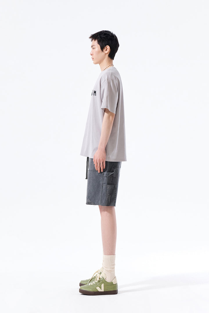 Matin Kim Herringbone Raw Cut Denim Shorts — Gray