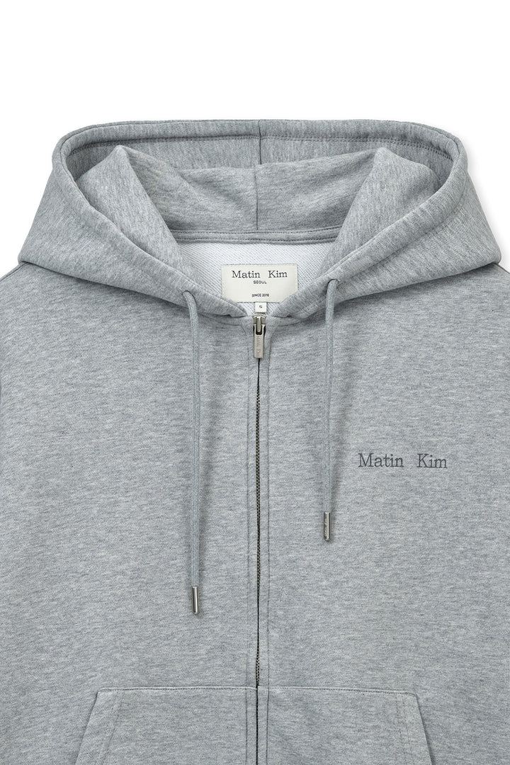 Matin Kim Back Logo Essential Zip Hoodie — Gray