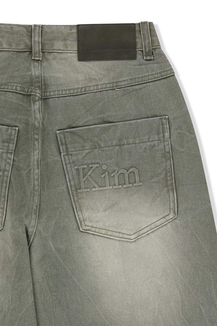 Matin Kim Back Logo Washed Denim Pants — Khaki